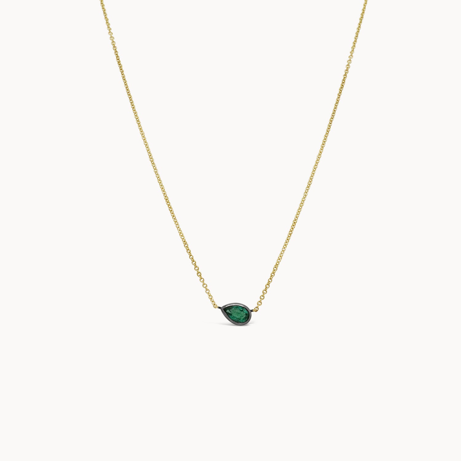 Pear Shaped Emerald East West Pendant Necklace